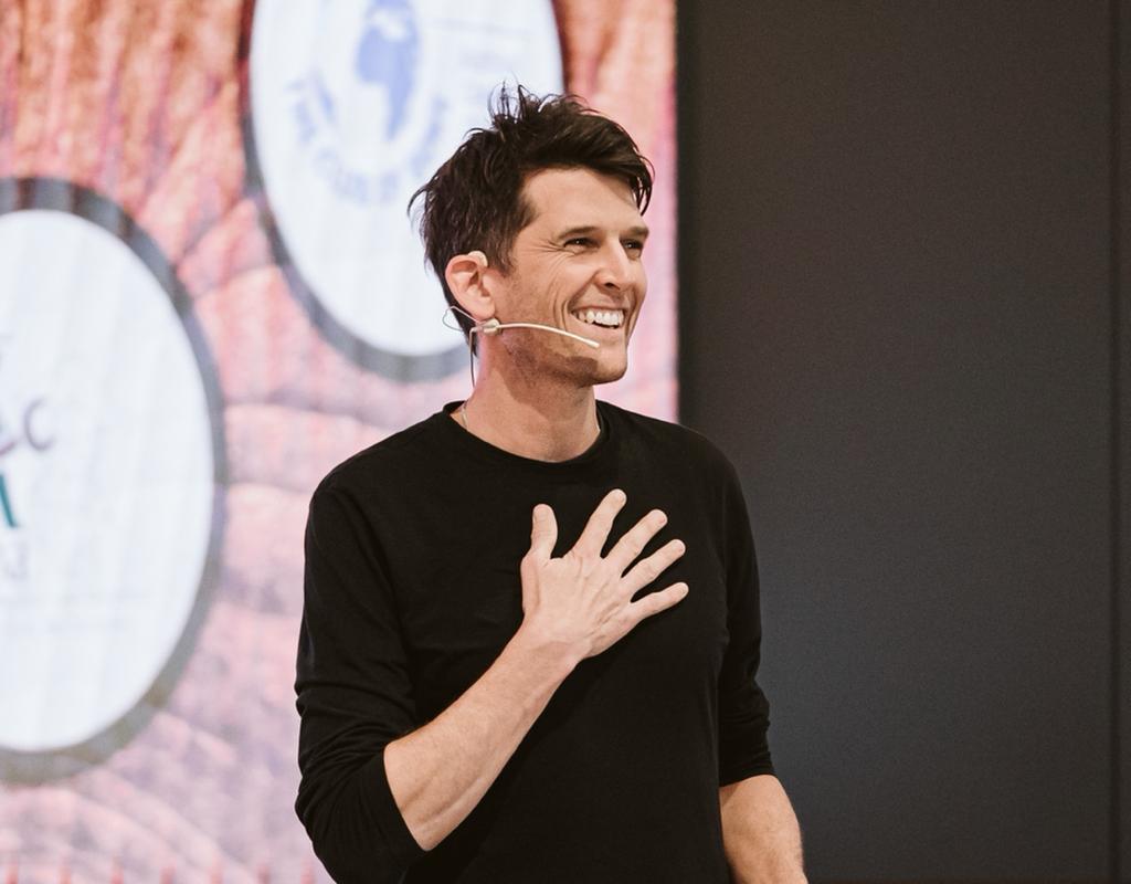 Harald Friedl speaking on stage